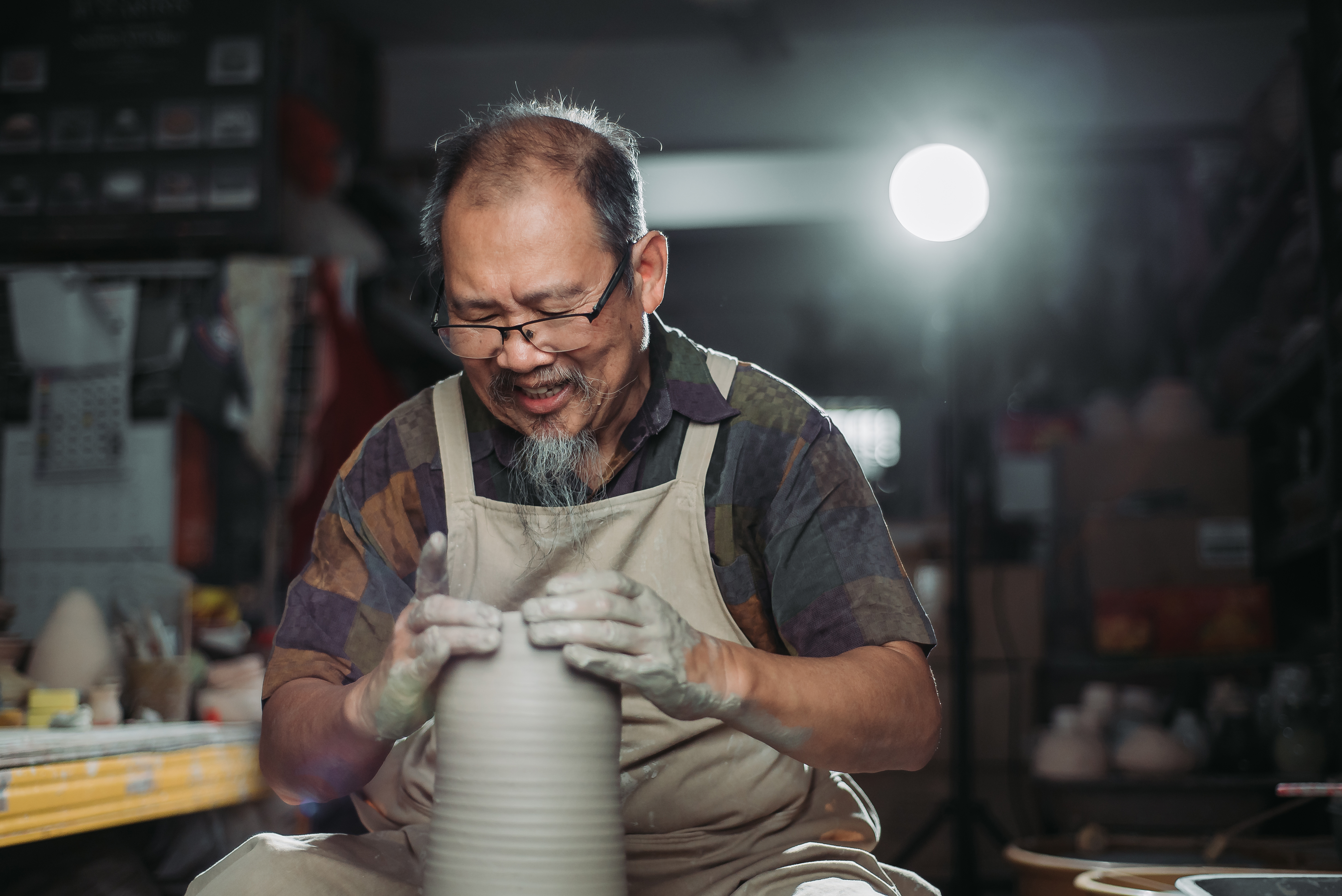 Person Using Pottery Wheel