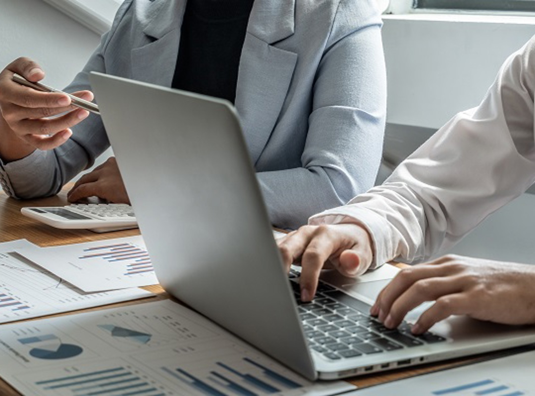 Typing On Laptop With Graphs PR