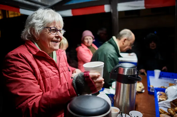 Person serving at a soup kitchen