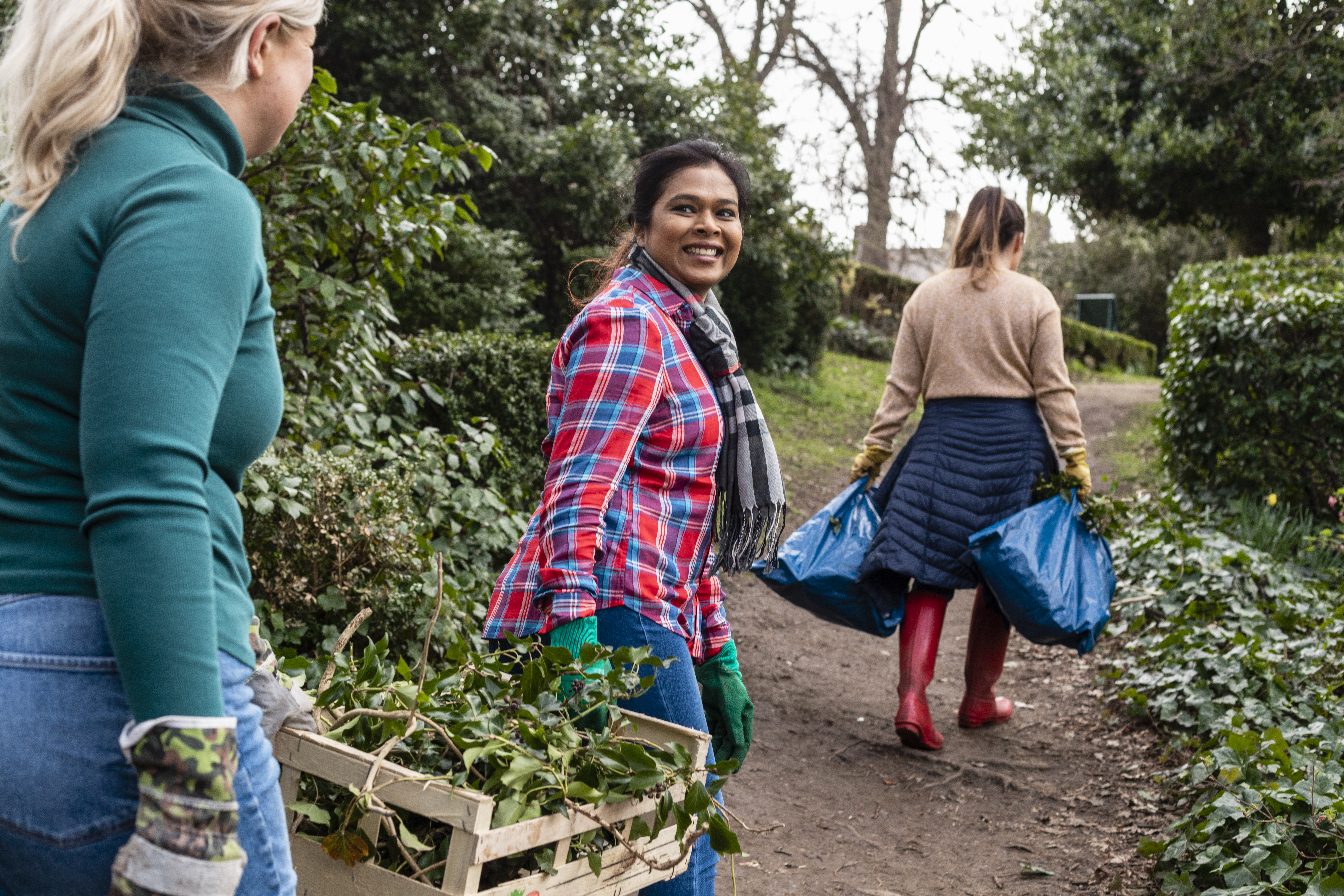 Three People Gardening