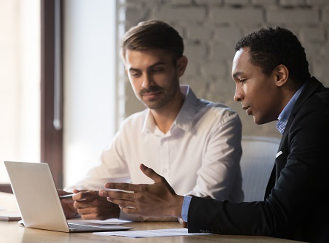 Two Colleagues In Deep Conversation Small