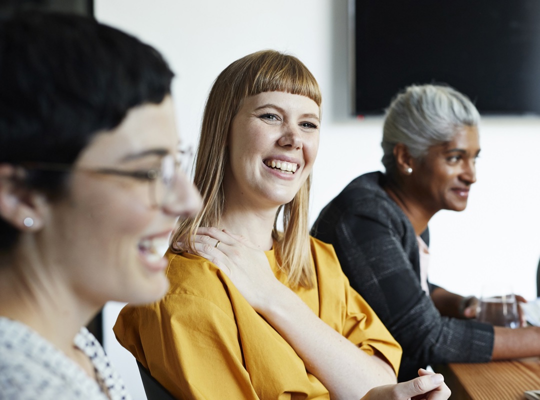Women In A Meeting Wearing Yellow Top