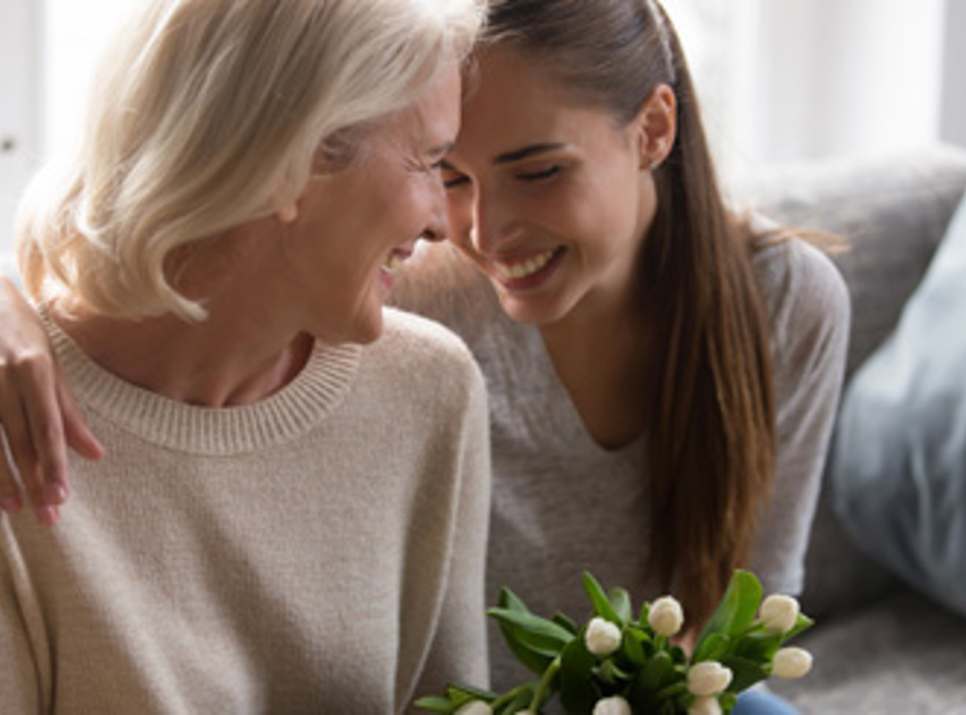 Two People Embracing Happily