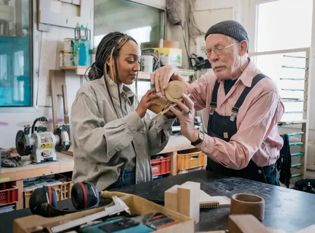 Two people in workshop