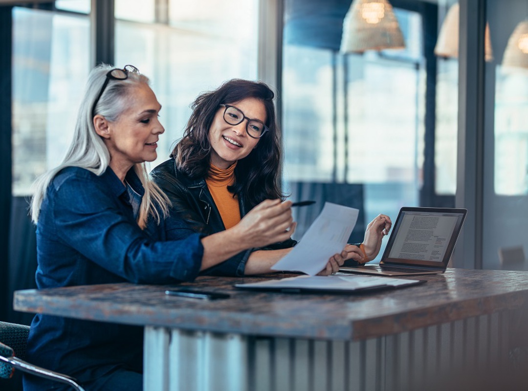 Two women working