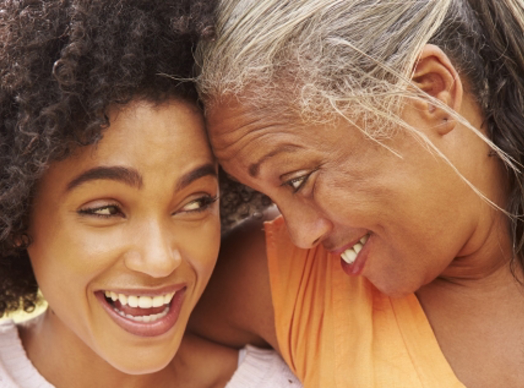 Two People Smiling At Each Other Cropped 0