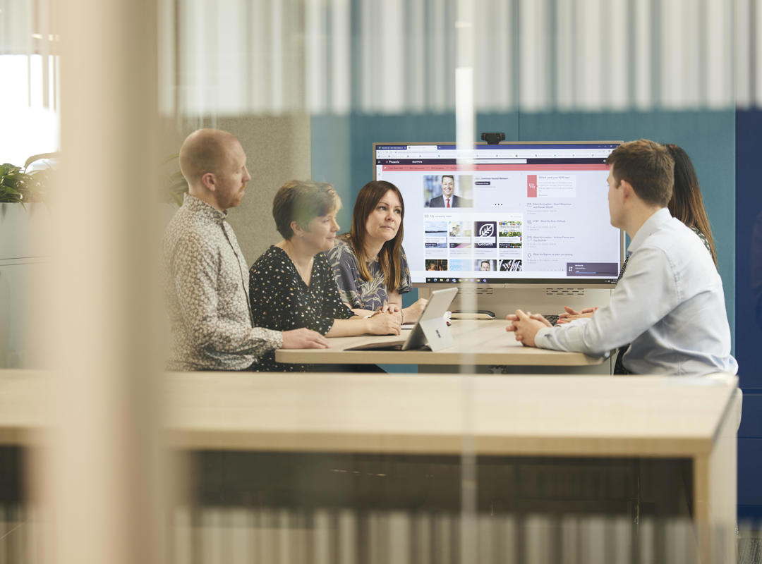 Five People In A Meeting