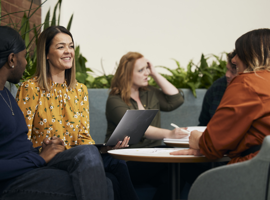 People Meeting In An Informal Setting